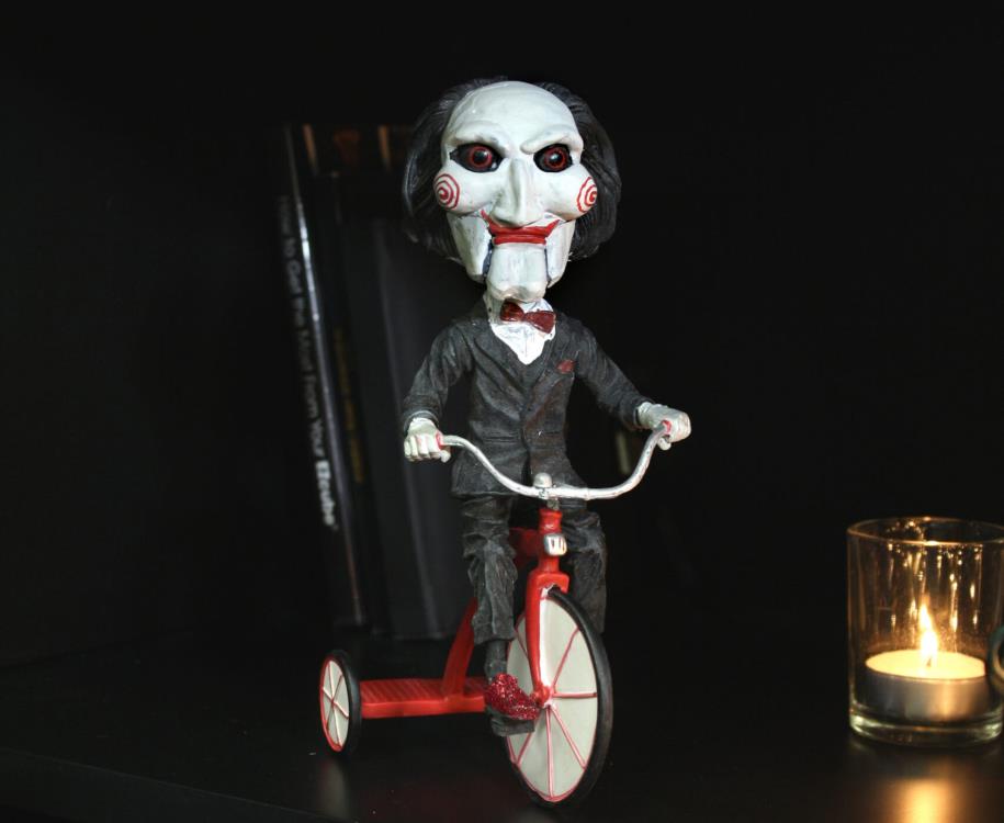 Saw Puppet on Tricycle Head Knocker Neca