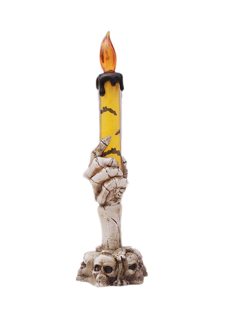 Vela led de mano de calavera
