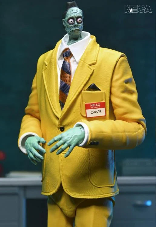 Primer plano del bolsillo del saco con la etiqueta que dice claramente "Dave".