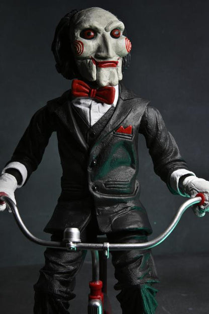 Saw Billy the Puppet on Tricycle 12" Figura Neca