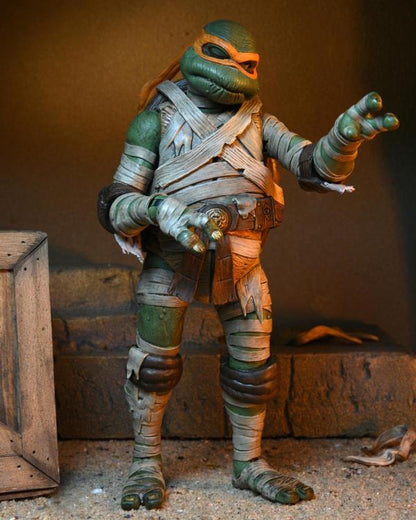 Universal Monsters x Teenage Mutant Ninja Turtles Ultimate Michelangelo as The Mummy Figura Neca