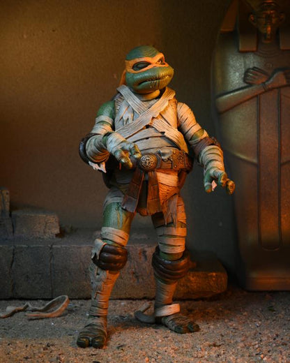 Universal Monsters x Teenage Mutant Ninja Turtles Ultimate Michelangelo as The Mummy Figura Neca
