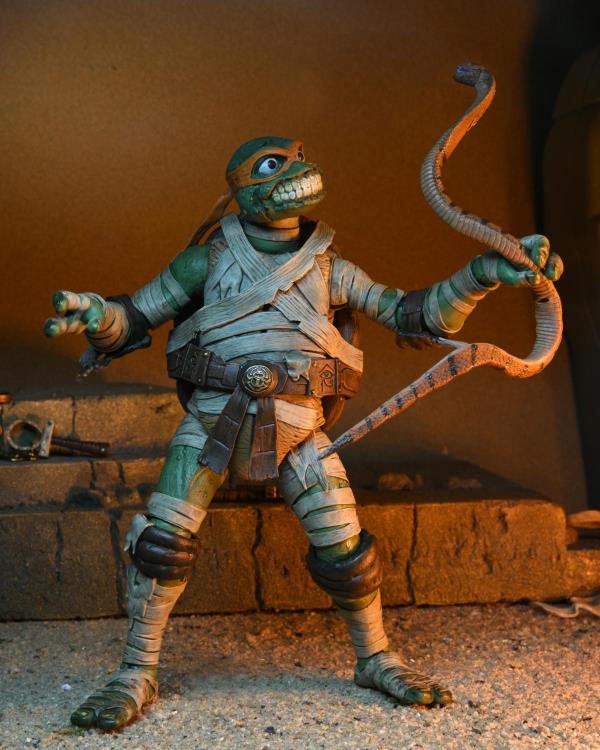 Universal Monsters x Teenage Mutant Ninja Turtles Ultimate Michelangelo as The Mummy Figura Neca