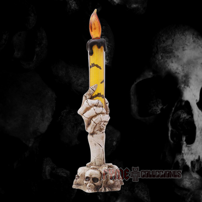 Vela led de mano de calavera