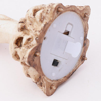 Vela led de mano de calavera