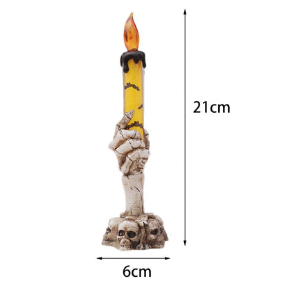 Vela led de mano de calavera